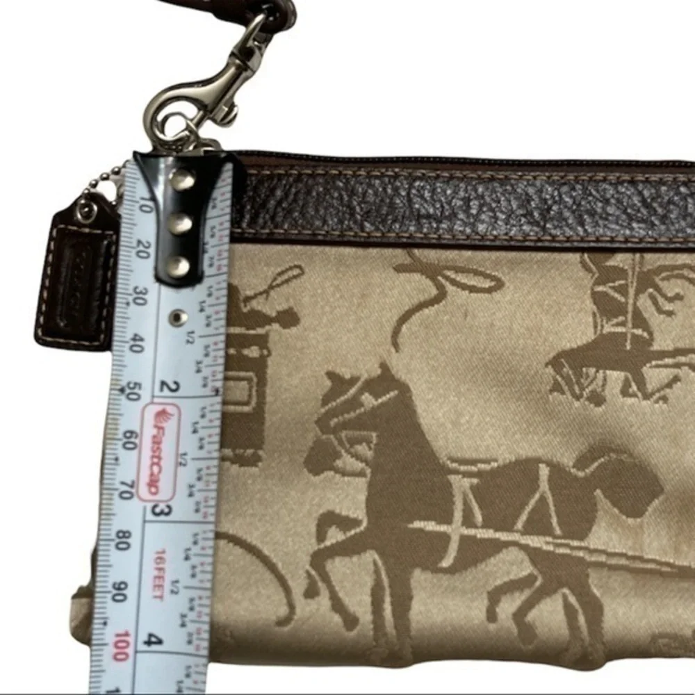 Coach carriage brown wristlet bag